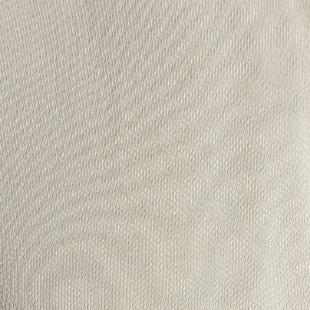 Beige fabric texture swatch